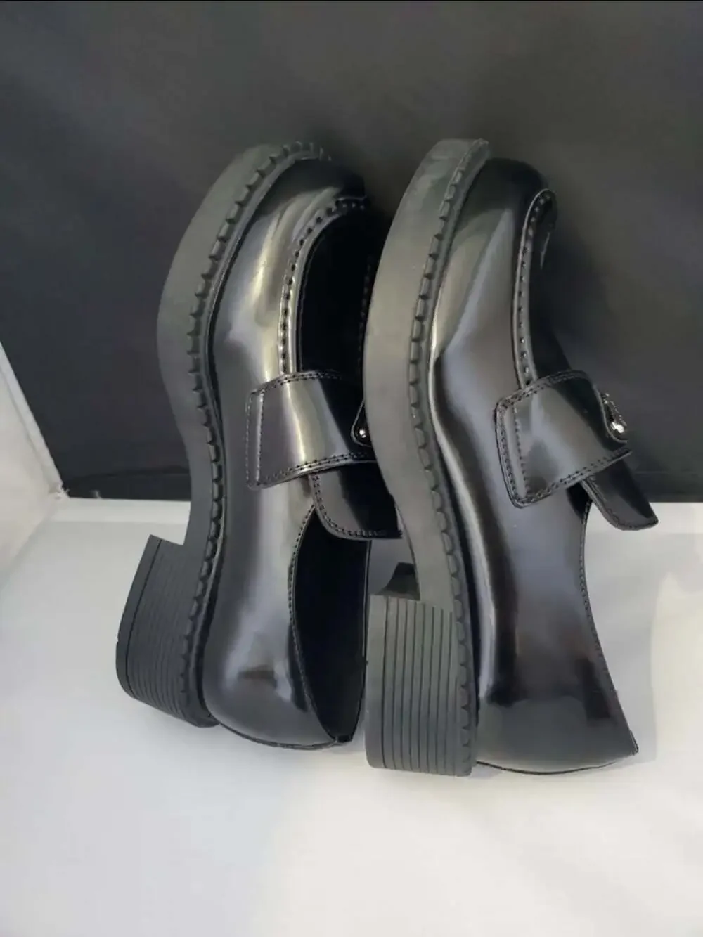 Prada Spazzolato Brushed Leather Loafers with Metal Triangle Logo
